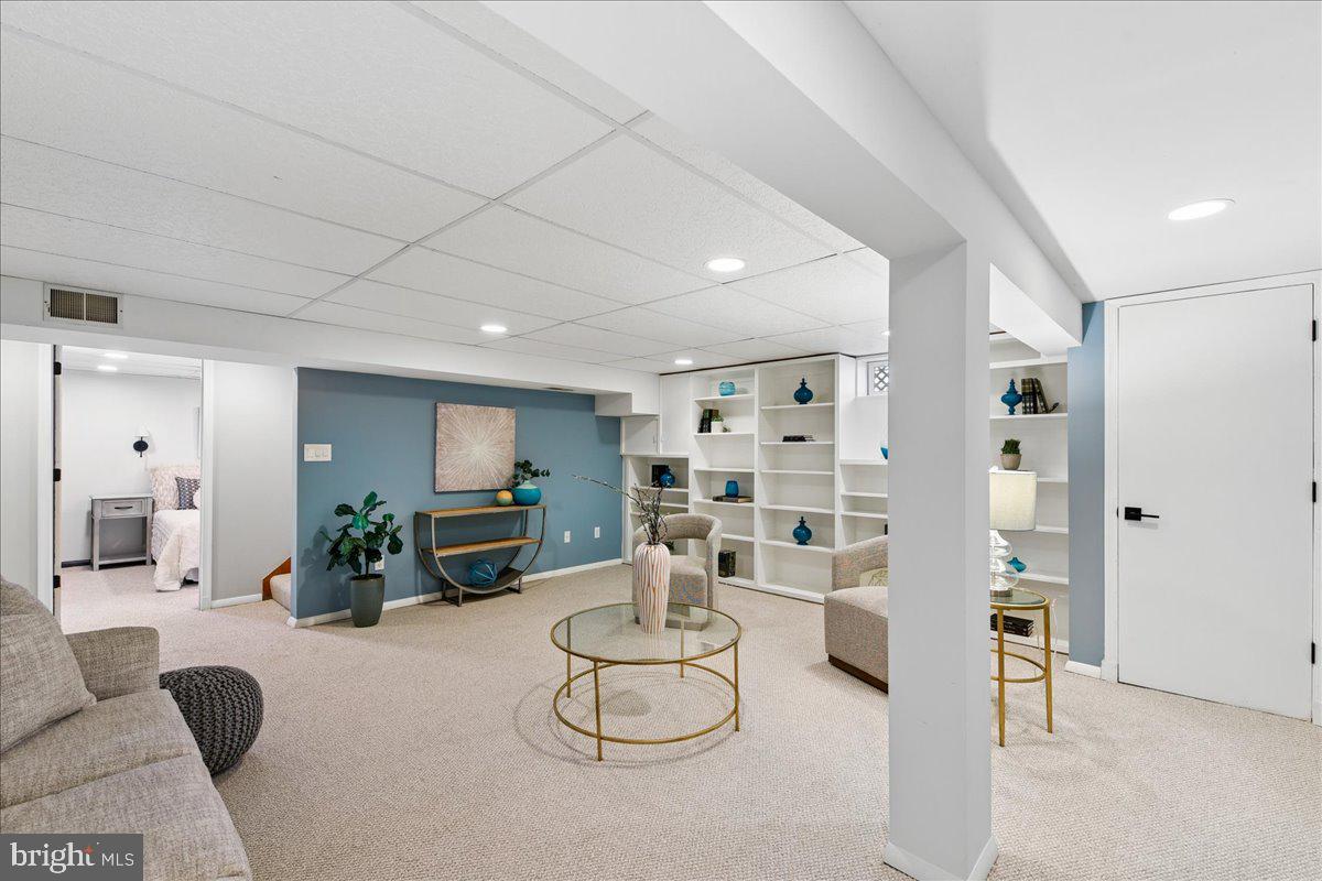 222 Spring Gap South Laurel, MD 20724 - Photo 36 of 60 Inviting basement retreat with modern flair.