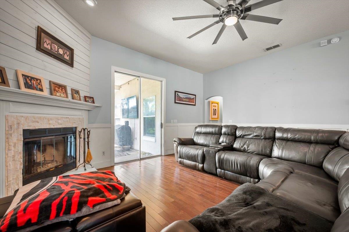1701 Keswick Road St. Augustine, FL 32084 - Photo 16 of 57 a bedroom with furniture and a fireplace