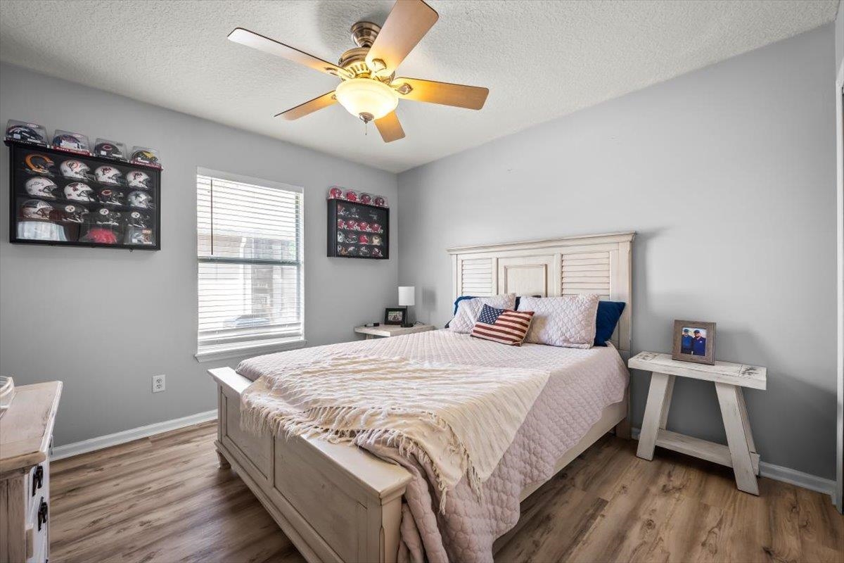 1701 Keswick Road St. Augustine, FL 32084 - Photo 19 of 57 a bedroom with a bed and a window