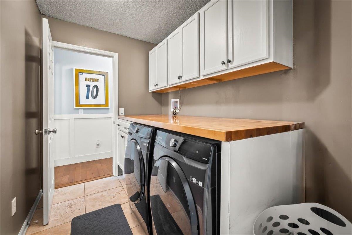 1701 Keswick Road St. Augustine, FL 32084 - Photo 26 of 57 a utility room with dryer and washer