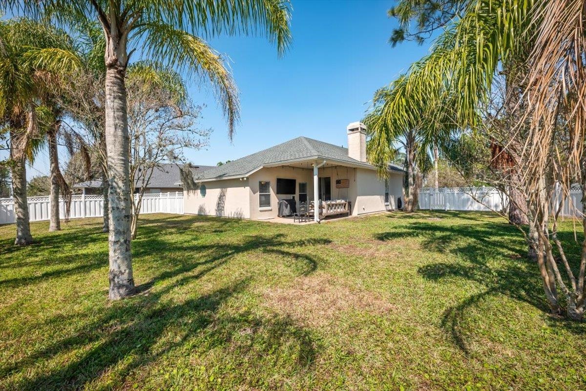 1701 Keswick Road St. Augustine, FL 32084 - Photo 29 of 57 a front view of a house with a yard