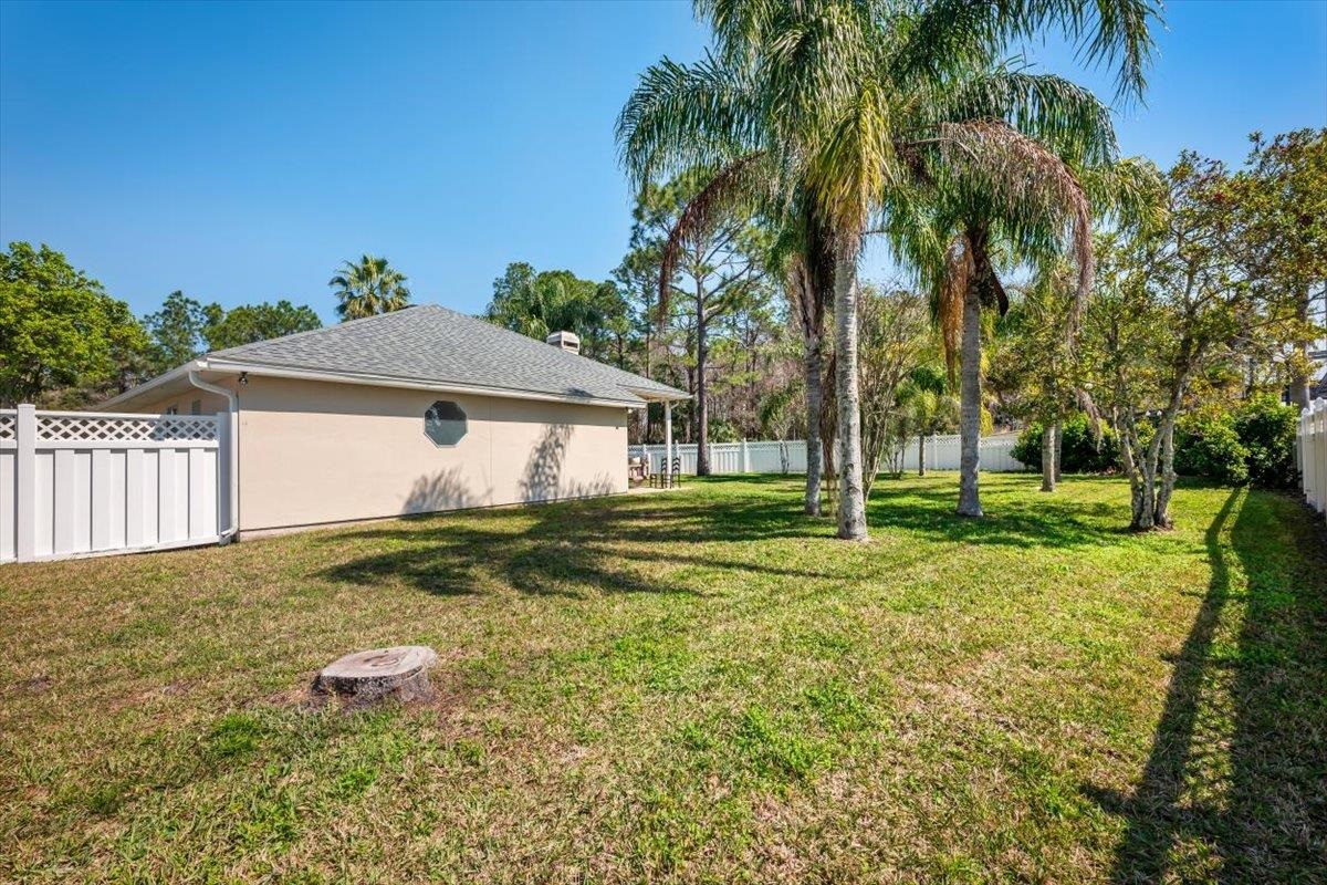 1701 Keswick Road St. Augustine, FL 32084 - Photo 30 of 57 a view of a house with a yard