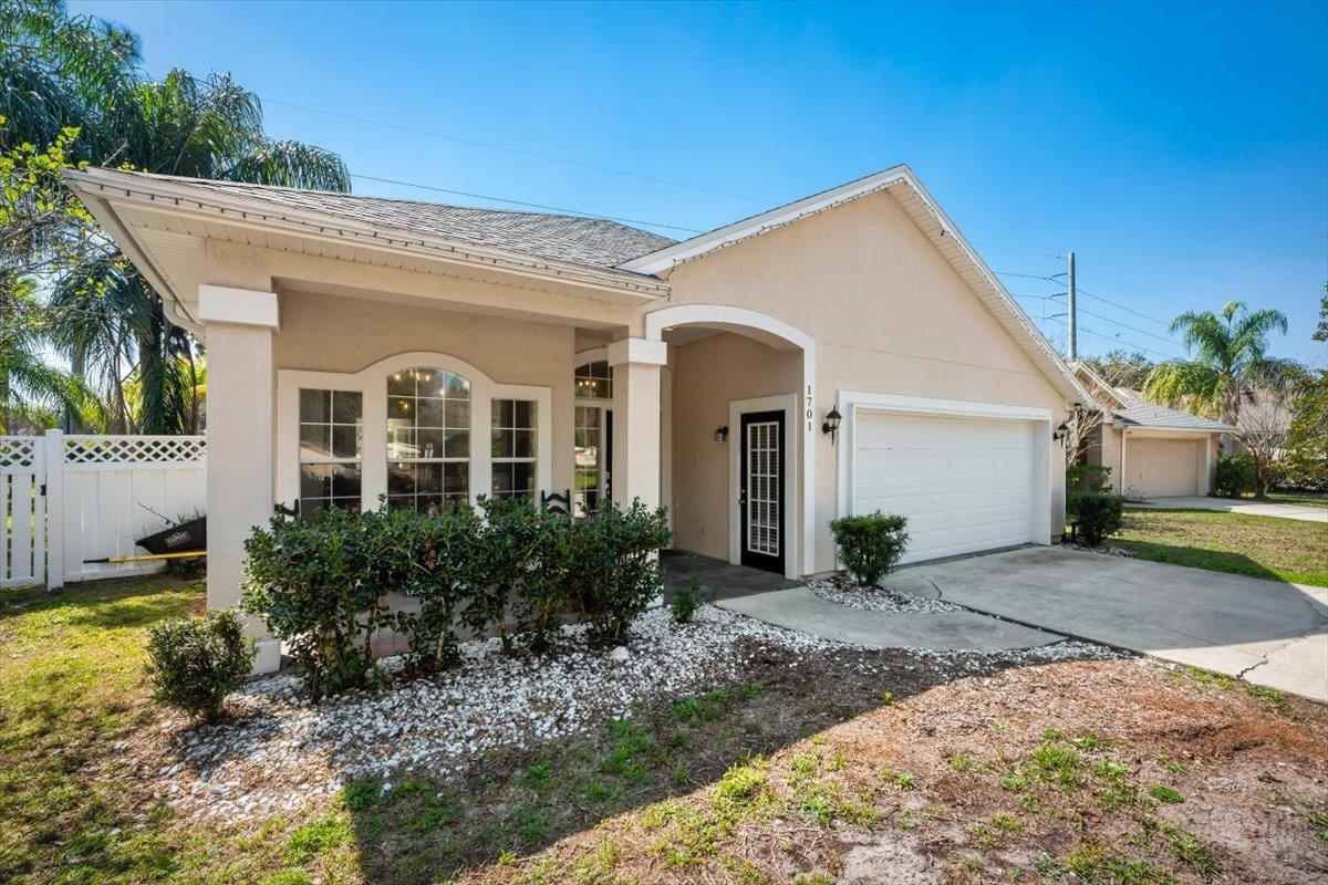 1701 Keswick Road St. Augustine, FL 32084 - Photo 32 of 57 a view of a house with a yard