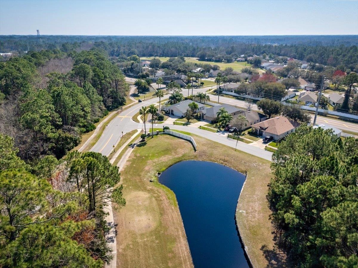1701 Keswick Road St. Augustine, FL 32084 - Photo 38 of 57 an aerial view of a house with a swimming pool