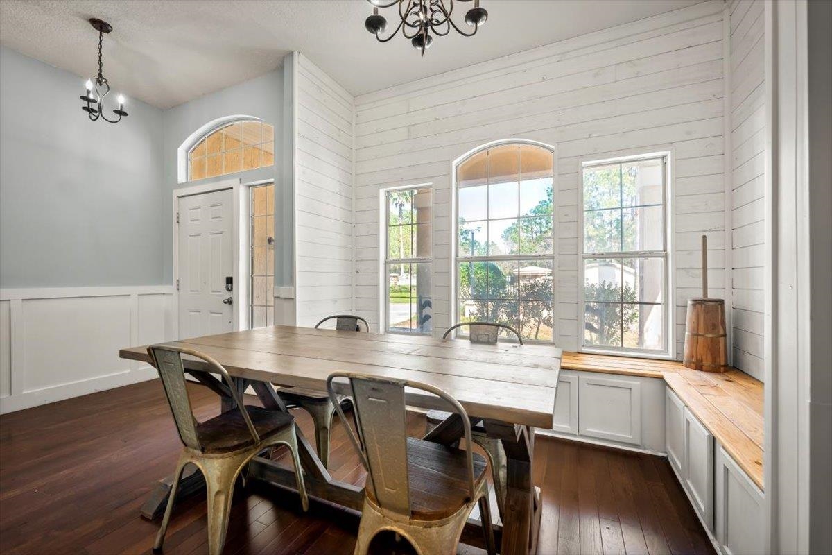 1701 Keswick Road St. Augustine, FL 32084 - Photo 7 of 57 a view of a a dining room with furniture window and wooden floor