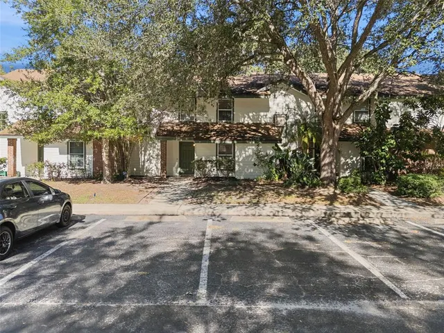 a car parked in front of a building
