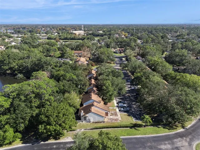 an aerial view of a houses with outdoor space and street view