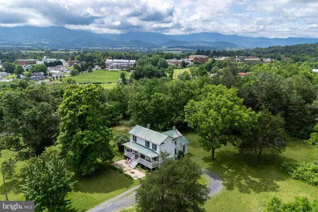 a house with trees in front of it