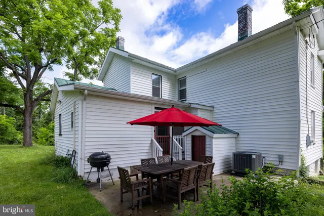a bed room with a bed and a window