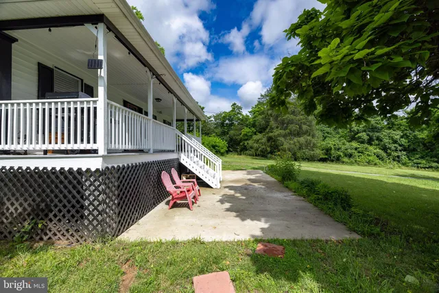 a kitchen with stainless steel appliances a stove microwave and cabinets