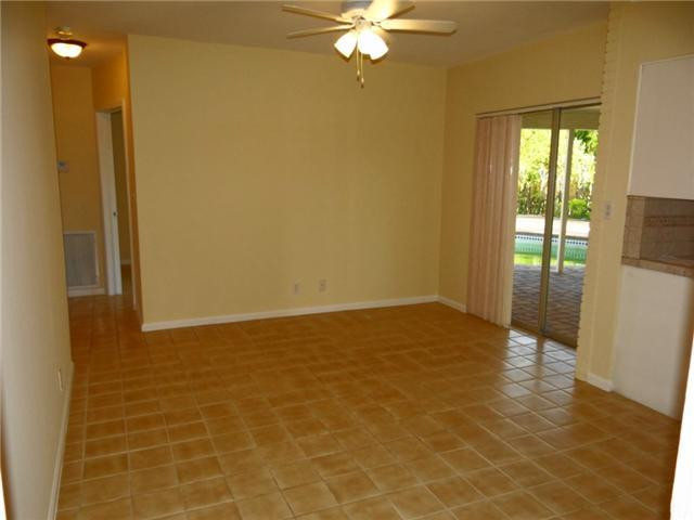 298 Southwest 9th Avenue Boca Raton, FL 33486 - Photo 3 of 10 a view of an empty room with a window