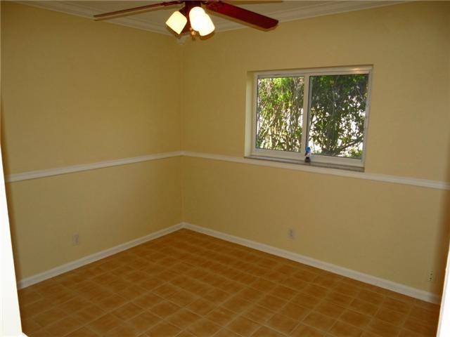 298 Southwest 9th Avenue Boca Raton, FL 33486 - Photo 6 of 10 an empty room with a window