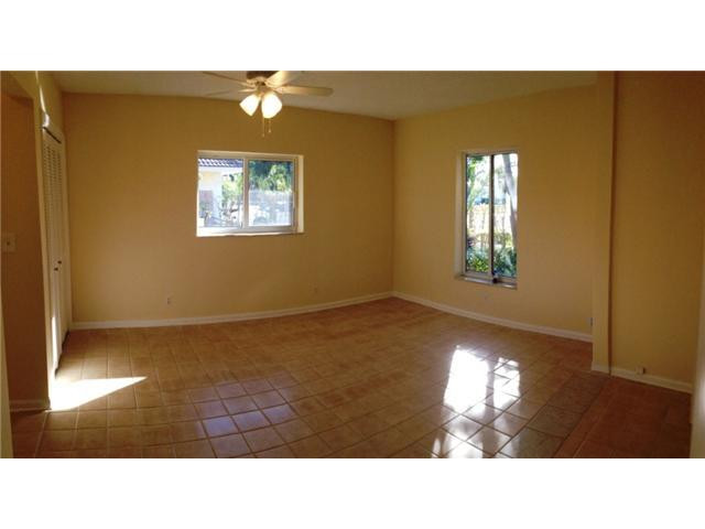 298 Southwest 9th Avenue Boca Raton, FL 33486 - Photo 10 of 10 a open kitchen with a window