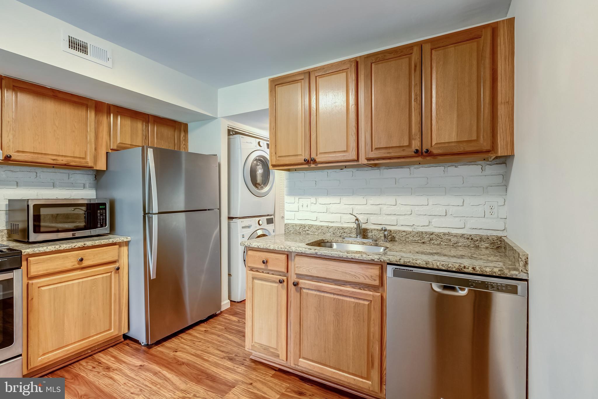 2012 Colts Neck Road, Unit 1A Reston, VA 20191 - Photo 14 of 23 Upgraded cabinets and granite