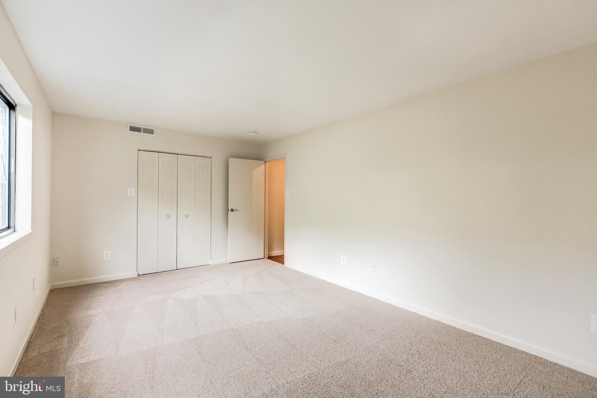 2012 Colts Neck Road, Unit 1A Reston, VA 20191 - Photo 17 of 23 Large bedroom from other side of room