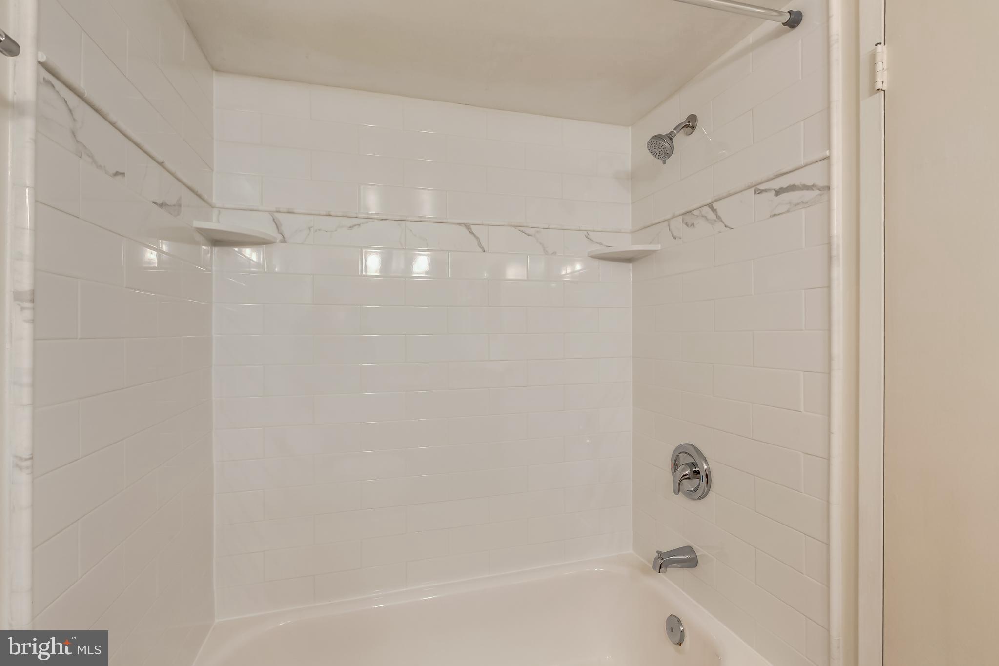 2012 Colts Neck Road, Unit 1A Reston, VA 20191 - Photo 19 of 23 Beautiful, brand-new, tiled shower!