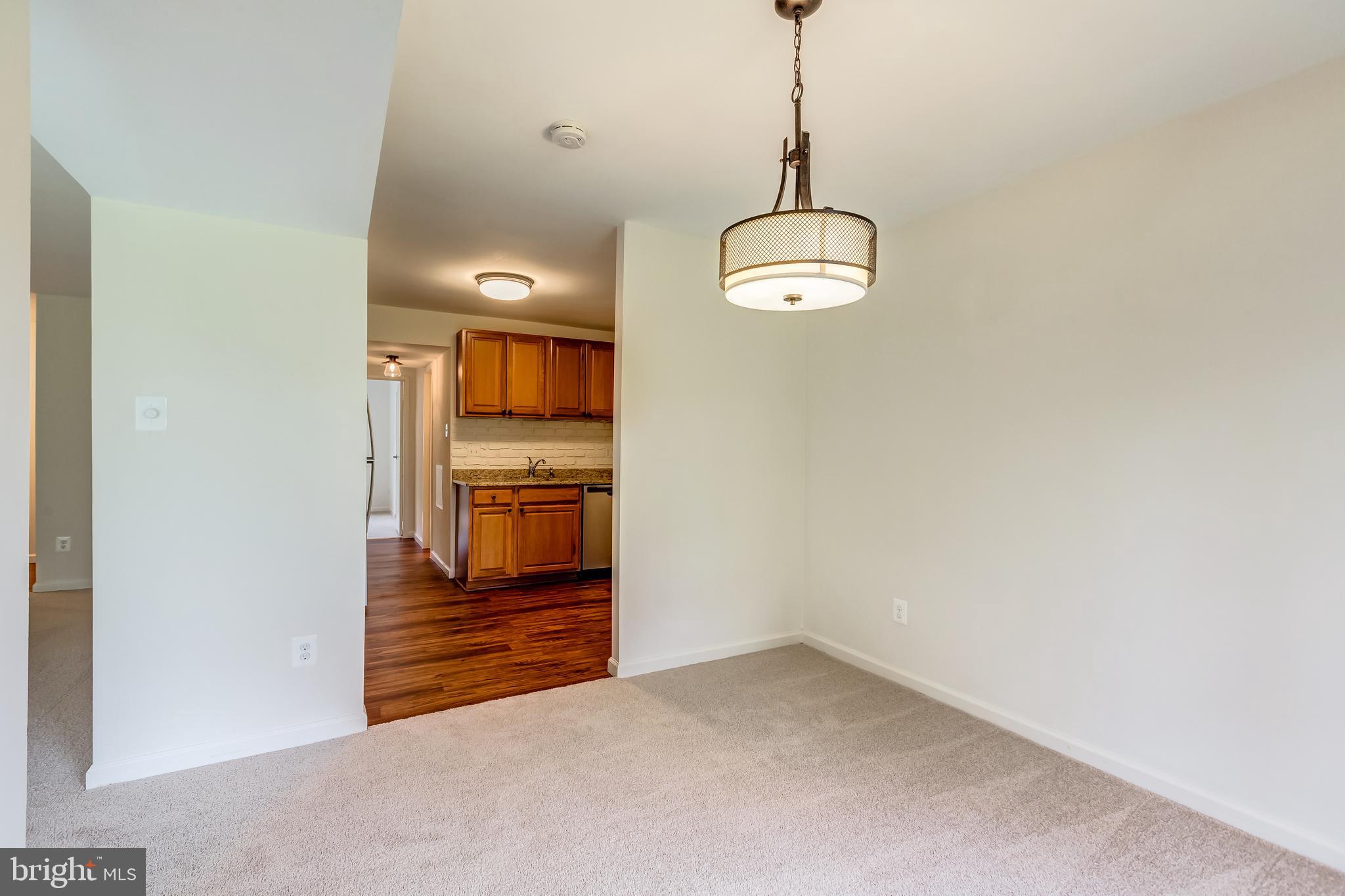 2012 Colts Neck Road, Unit 1A Reston, VA 20191 - Photo 9 of 23 Dining room looking into kitchen