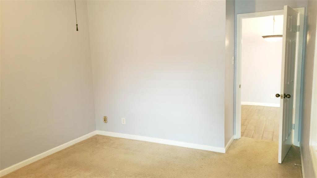 2105 Count Fleet Drive, Unit 212 Arlington, TX 76011 - Photo 8 of 14 a view of an empty room