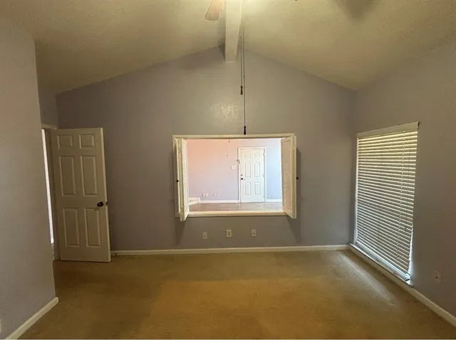 an empty room with a window