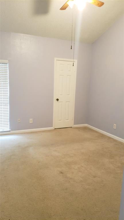 2105 Count Fleet Drive, Unit 212 Arlington, TX 76011 - Photo 9 of 14 an empty room with an entryway