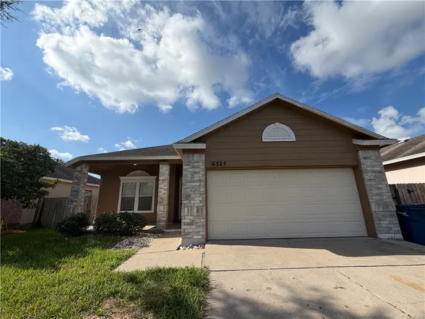 a front view of house with yard