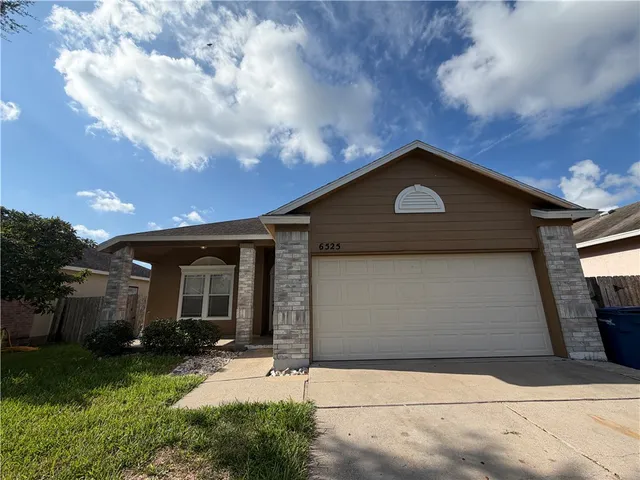 a front view of house with yard