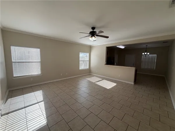 a view of an empty room and window