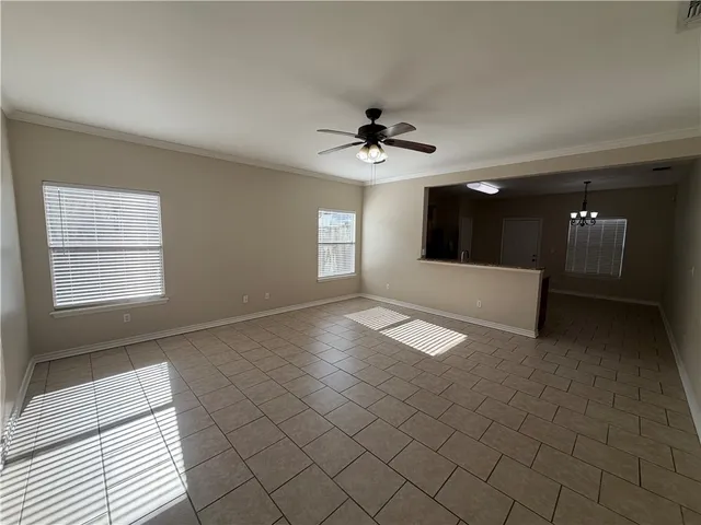 a view of an empty room and window