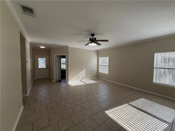 a kitchen with stainless steel appliances granite countertop a stove a refrigerator and a stove