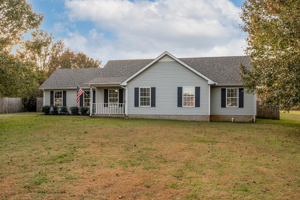 636 Crescent Road Murfreesboro, TN 37128 - Photo 1 of 22 a front view of a house with a garden