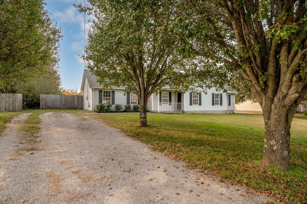 636 Crescent Road Murfreesboro, TN 37128 - Photo 22 of 22 a front view of a house with a yard