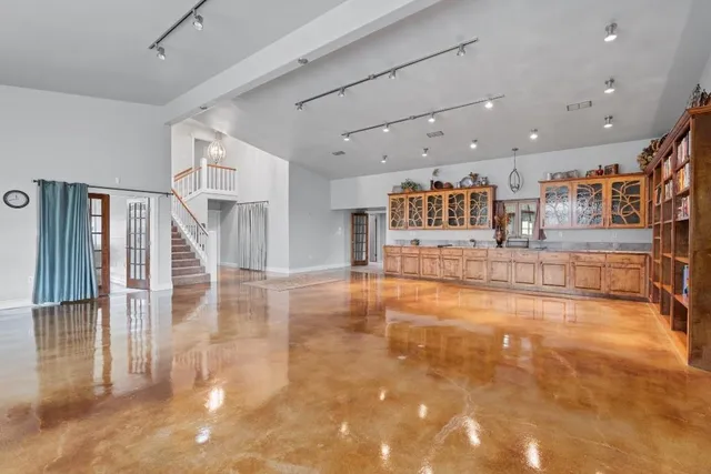 a view of a hallway with a room