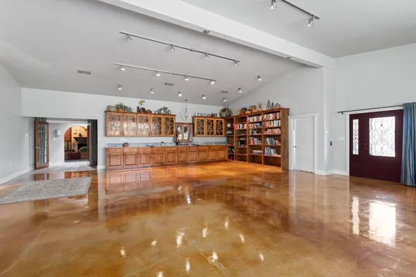 a view of an empty room with stairs