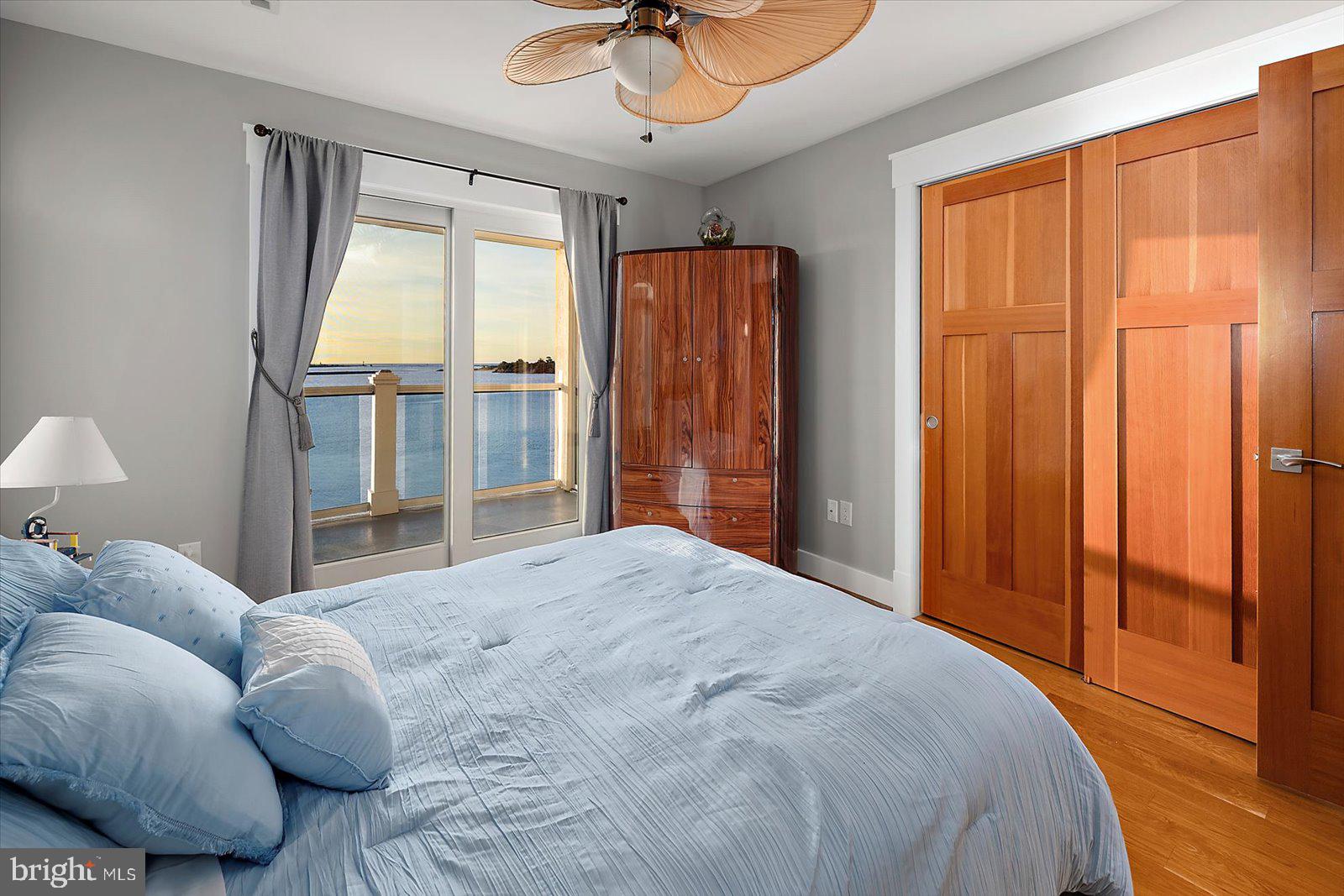 12957 Harbor Road Ocean City, MD 21842 - Photo 110 of 148 a bedroom with a bed and a window