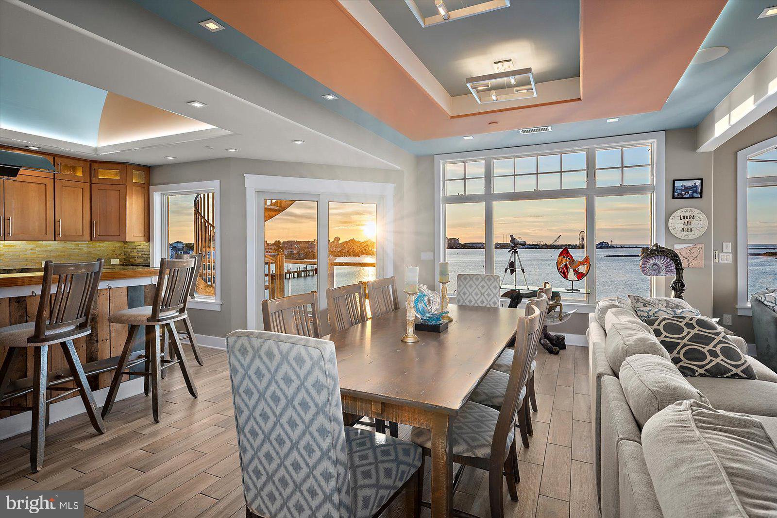 12957 Harbor Road Ocean City, MD 21842 - Photo 11 of 148 a view of a dining room with furniture window and outside view