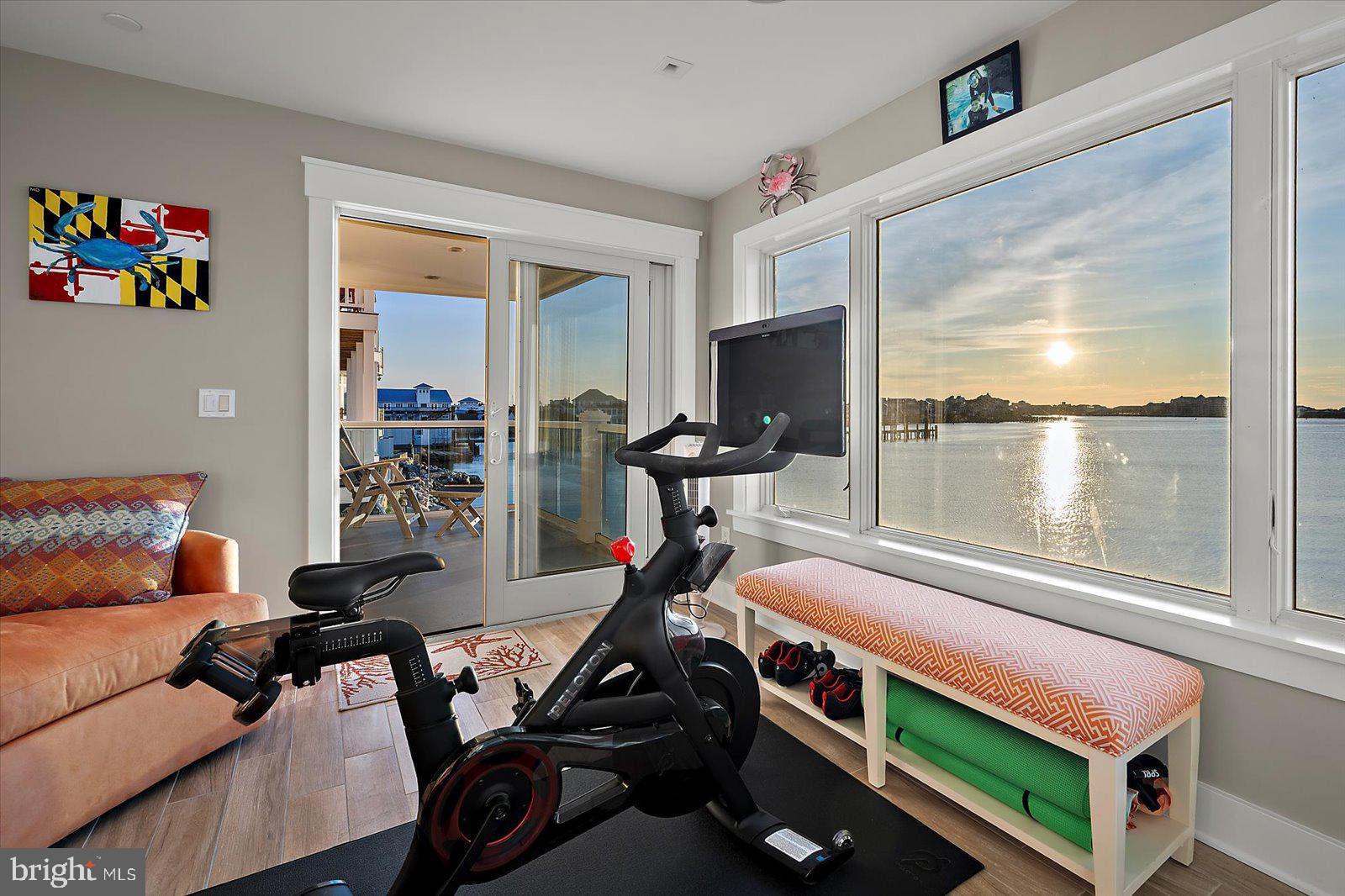 12957 Harbor Road Ocean City, MD 21842 - Photo 117 of 148 a bedroom with furniture and a window