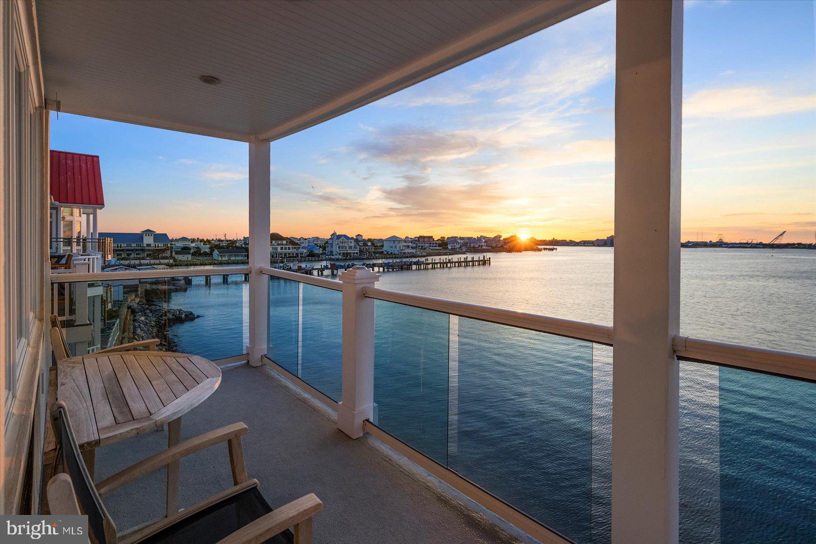 12957 Harbor Road Ocean City, MD 21842 - Photo 130 of 148 a view of a balcony with an ocean view