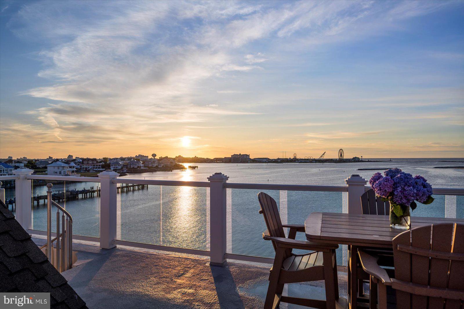 12957 Harbor Road Ocean City, MD 21842 - Photo 133 of 148 a view of a chairs and table on the terrace