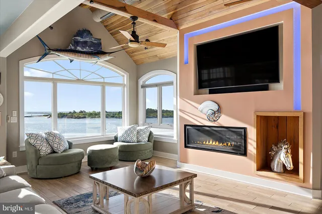 a view of a livingroom with furniture and entryway
