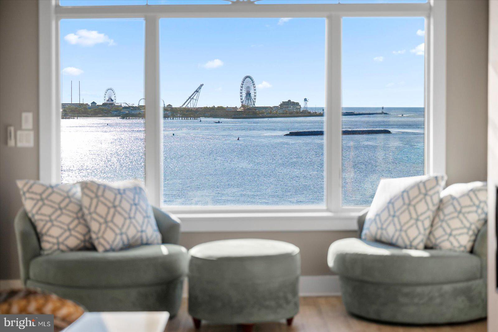 12957 Harbor Road Ocean City, MD 21842 - Photo 22 of 148 a living room with furniture and a window