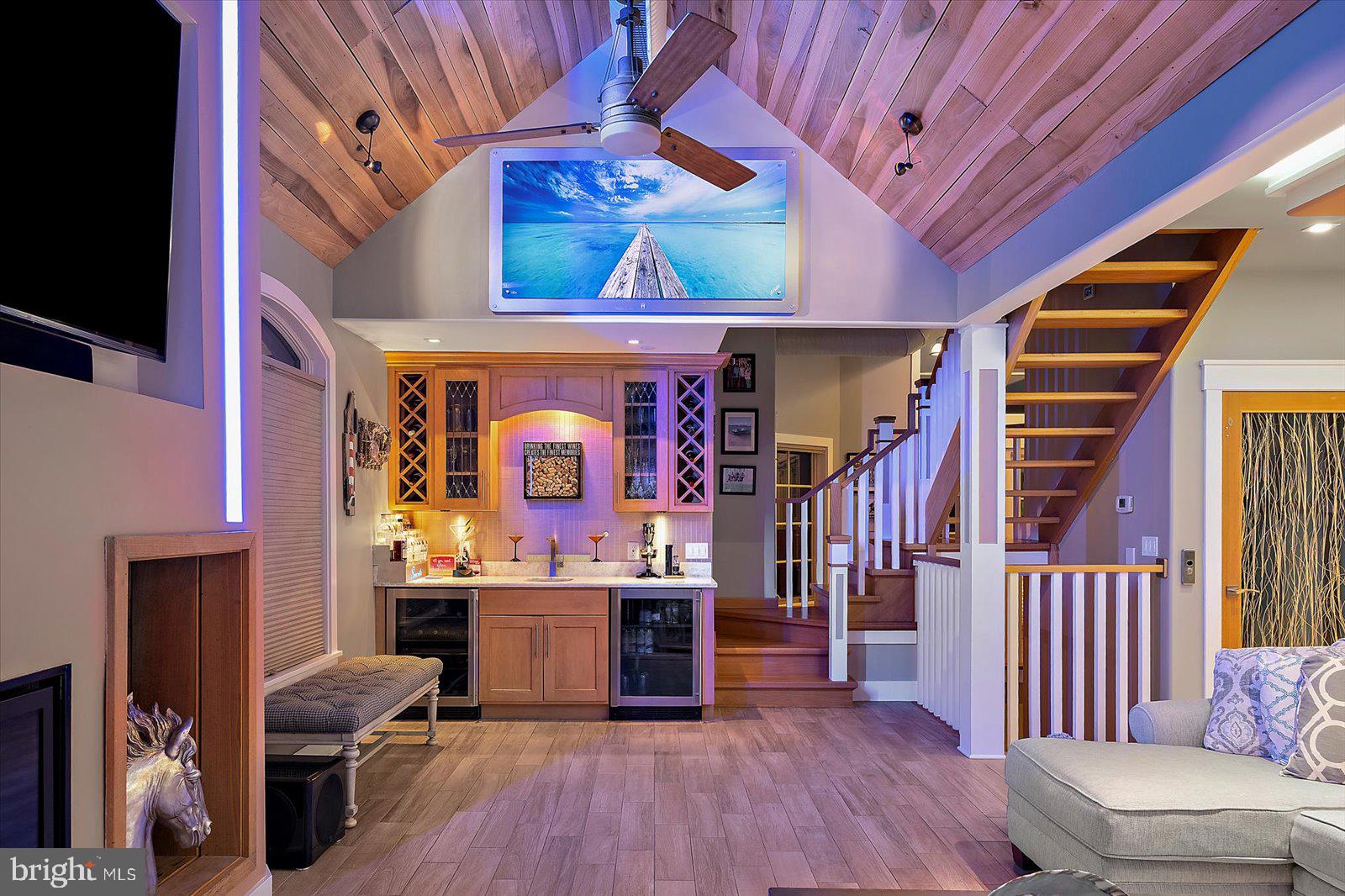 12957 Harbor Road Ocean City, MD 21842 - Photo 34 of 148 a room with furniture and wooden floor