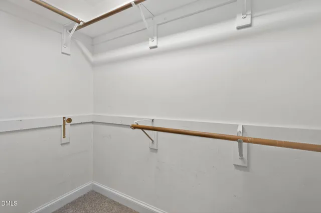 a view of a room with racks on the wall