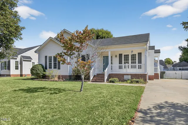 a house view with a garden space