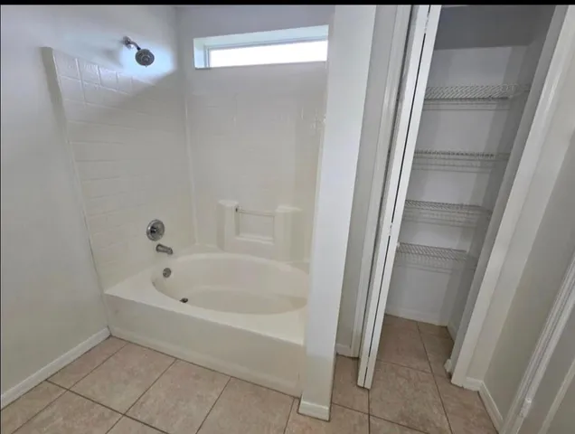a bathroom with a bathtub