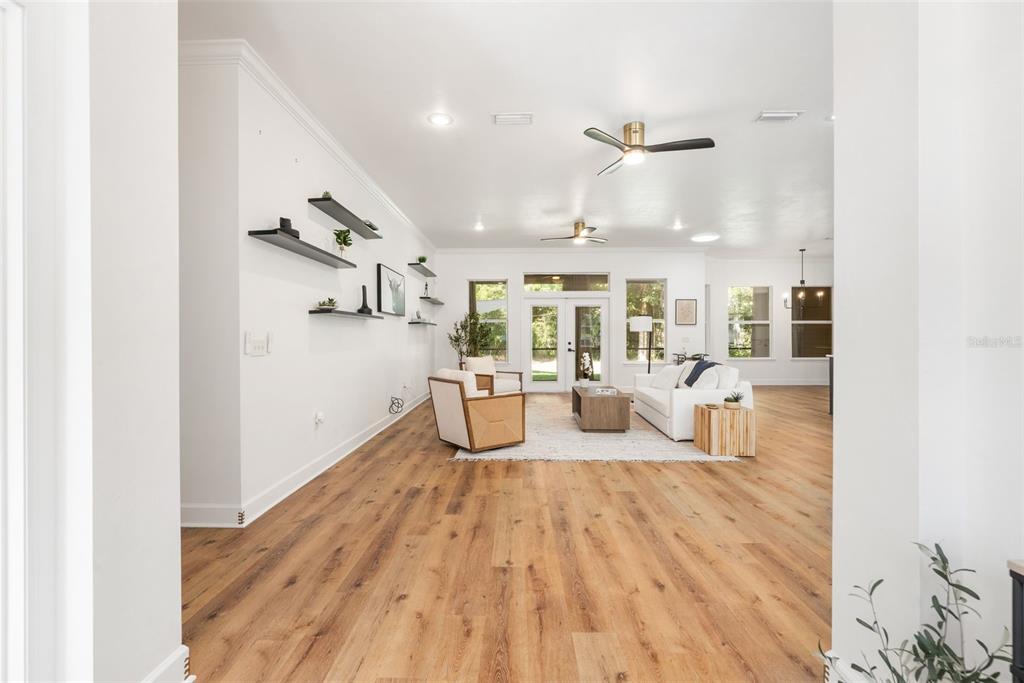 6326 Southwest 90th Street Gainesville, FL 32608 - Photo 2 of 44 a living room with furniture and a large window