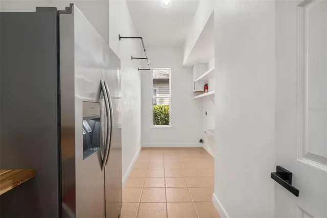 a view of hallway with washer and dryer