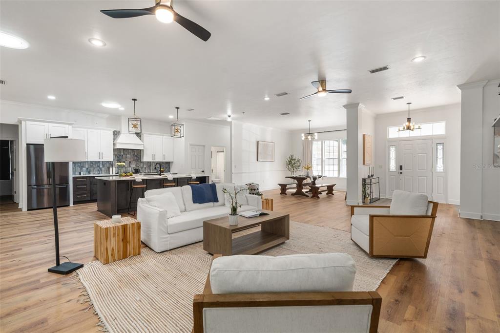 6326 Southwest 90th Street Gainesville, FL 32608 - Photo 31 of 44 a living room with furniture and kitchen view