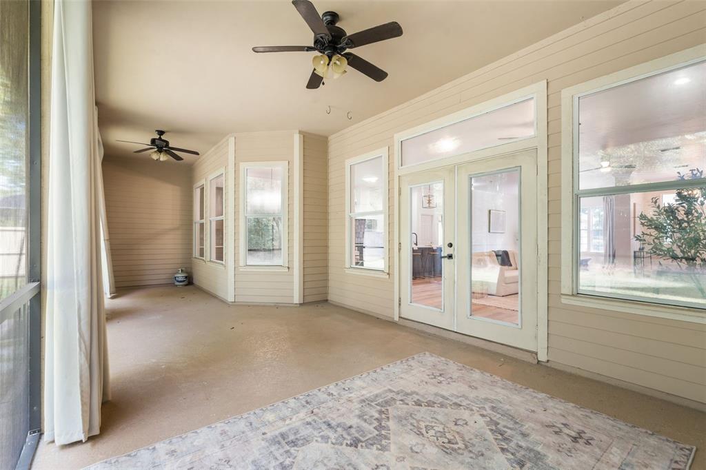 6326 Southwest 90th Street Gainesville, FL 32608 - Photo 33 of 44 a view of a big room with entryway and wooden floor