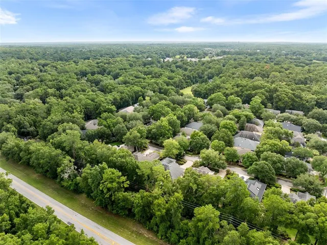 an aerial view of a city with lots of residential buildings