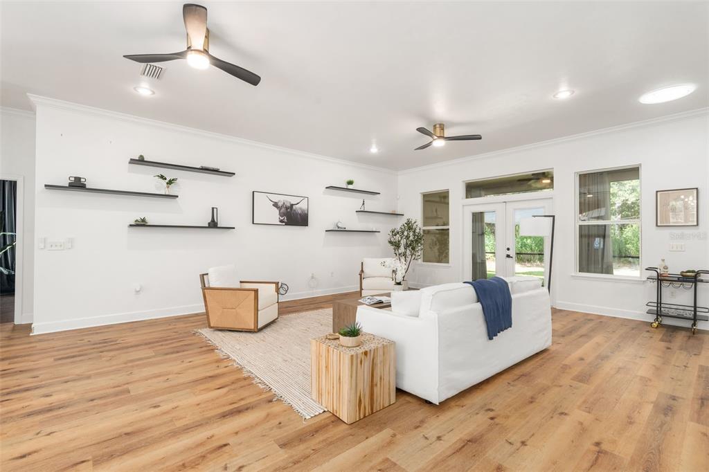 6326 Southwest 90th Street Gainesville, FL 32608 - Photo 6 of 44 a large white kitchen with a large window